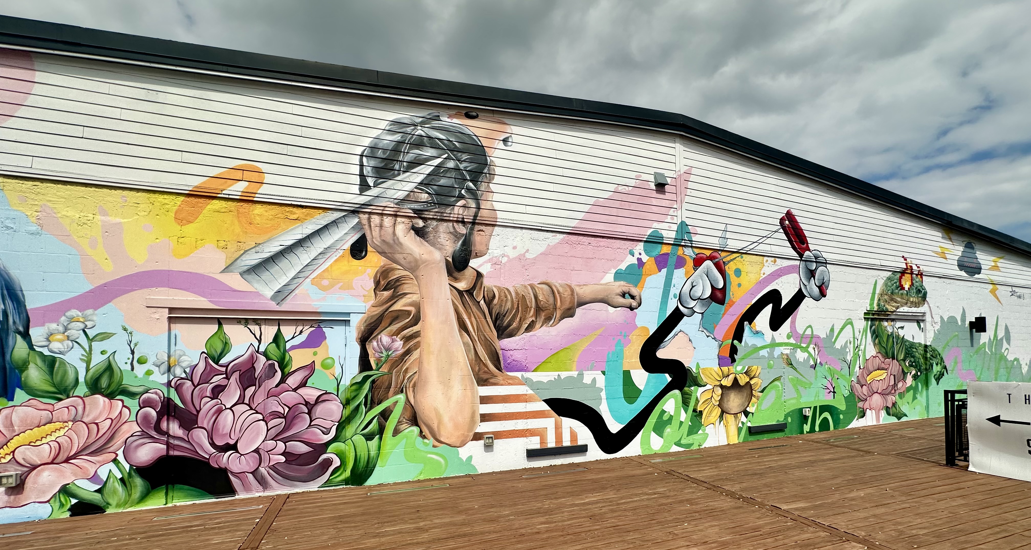 Frankie Gonzalez child with slingshot and peony
